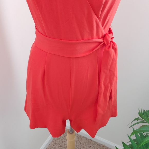 (SOLD) Ann Taylor Coral Ruffle Short Sleeve Plunge Belted Tie Waist Romper - Picture 3 of 8